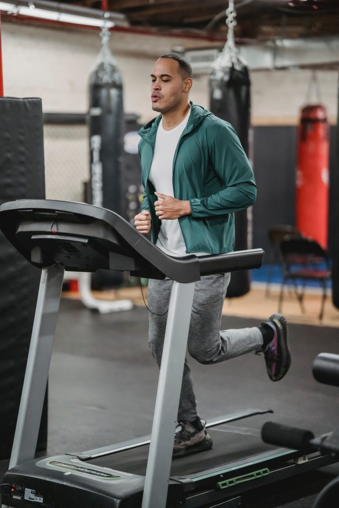 A man is running on the treadmill