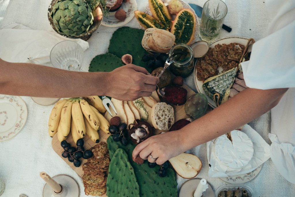 man and woman enjoy healthy snacks