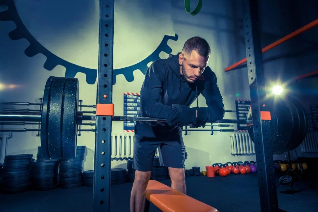 Picture3 Being a fitness coach requires focus and dedication, as shown by this man preparing for strength training.