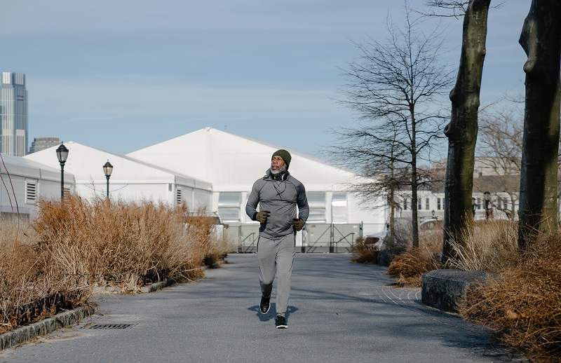 A Senior trainer is jogging 