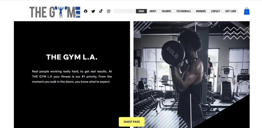 Screenshot of The Gym L.A. website homepage showing a weightlifting banner image and fitness-focused introduction text.