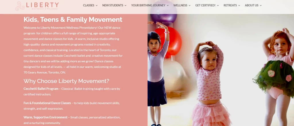 Three young children practicing ballet movements in a warm, playful kids’ dance class.