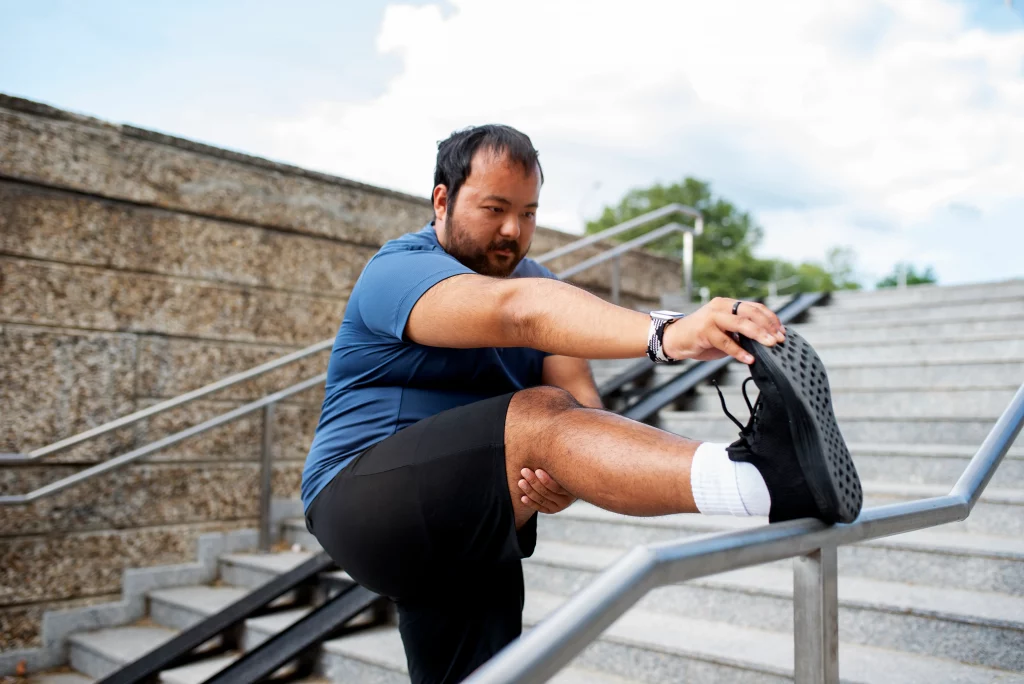 Man doing an outdoor exercise for a weight loss personal training program